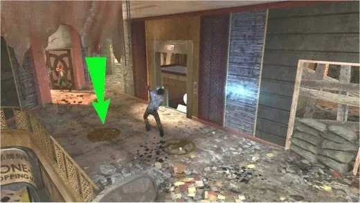 Flecha verde señalando el Símbolo del Suelo de Quick Revive
